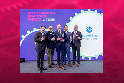 Ardagh Glass Packaging colleagues collecting their award from Merck