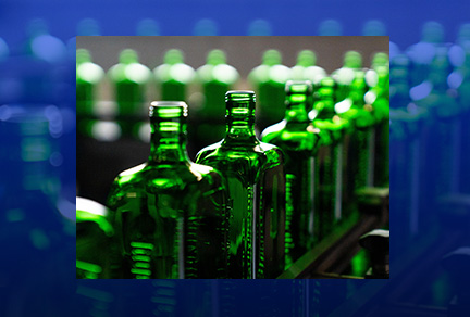 Jaegermeister bottles on the glass production line